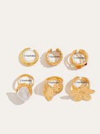 6-delige ringenset met botanische en parelaccenten