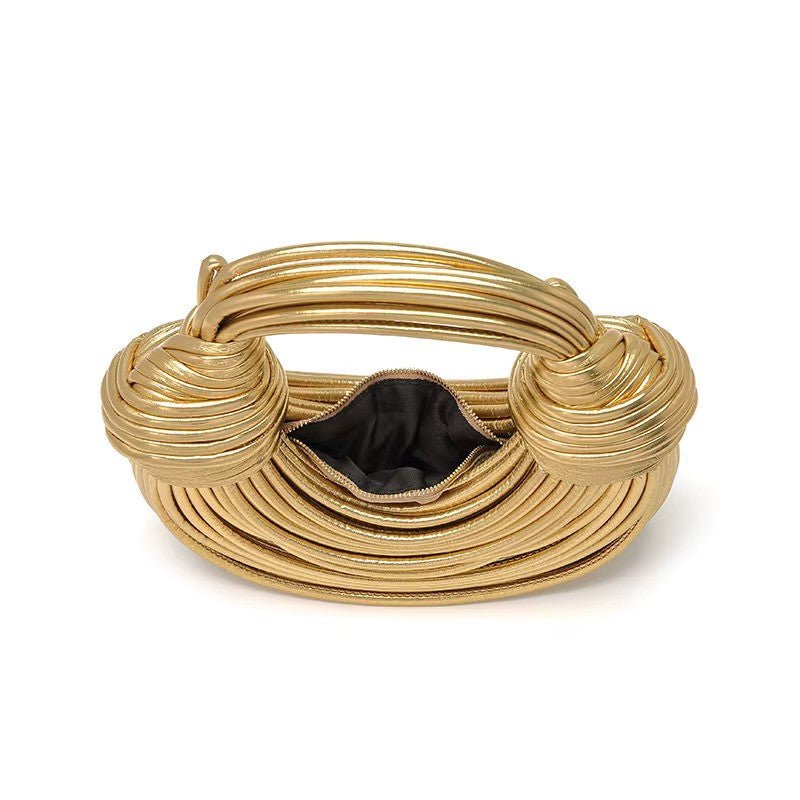 Gouden gedraaide handtas