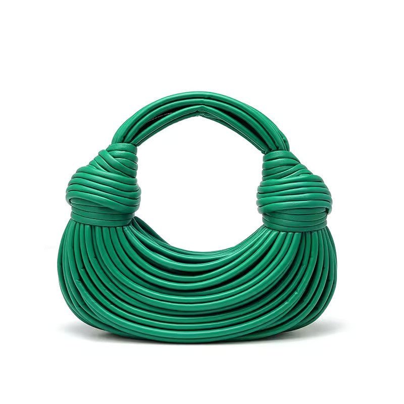 Gouden gedraaide handtas